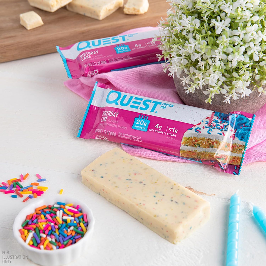 Celebrate every day with&nbsp;Quest Nutrition Birthday Cake Protein Bars, a festive treat packed with 20g of complete dairy-based protein containing all 9 essential amino acids. Each bar offers only 1g sugar, 4g net carbs, and 12g fiber, making it the perfect keto-friendly, gluten-free protein snack. Enjoy the sweet, cake-like flavor without added sugar—ideal for post-workout recovery, a high-protein low-carb snack, or an on-the-go guilt-free dessert that keeps your nutrition goals on track.