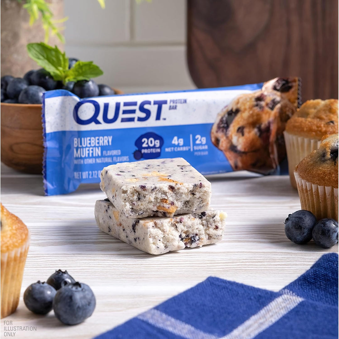 Enjoy the taste of a fresh blueberry muffin anytime with Quest Nutrition Blueberry Muffin Protein Bars. Each bar provides 20g of complete dairy-based protein, 2g sugar, 5g net carbs, and 13g fiber, making it a perfect gluten-free, keto-friendly snack for on-the-go energy or post-workout recovery. 
