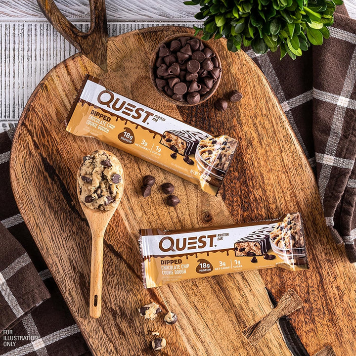 Indulge in the rich taste of cookie dough with Quest Dipped Chocolate Chip Cookie Dough Protein Bars. Each 1.76 oz bar delivers 18g of complete dairy-based protein, 3g net carbs, 9g fiber, and just 1g sugar, making it the perfect keto-friendly, gluten-free snack. Topped with a luscious chocolatey drizzle and packed with chocolate chips, these bars fuel muscle recovery, curb cravings, and support a balanced macro diet. 