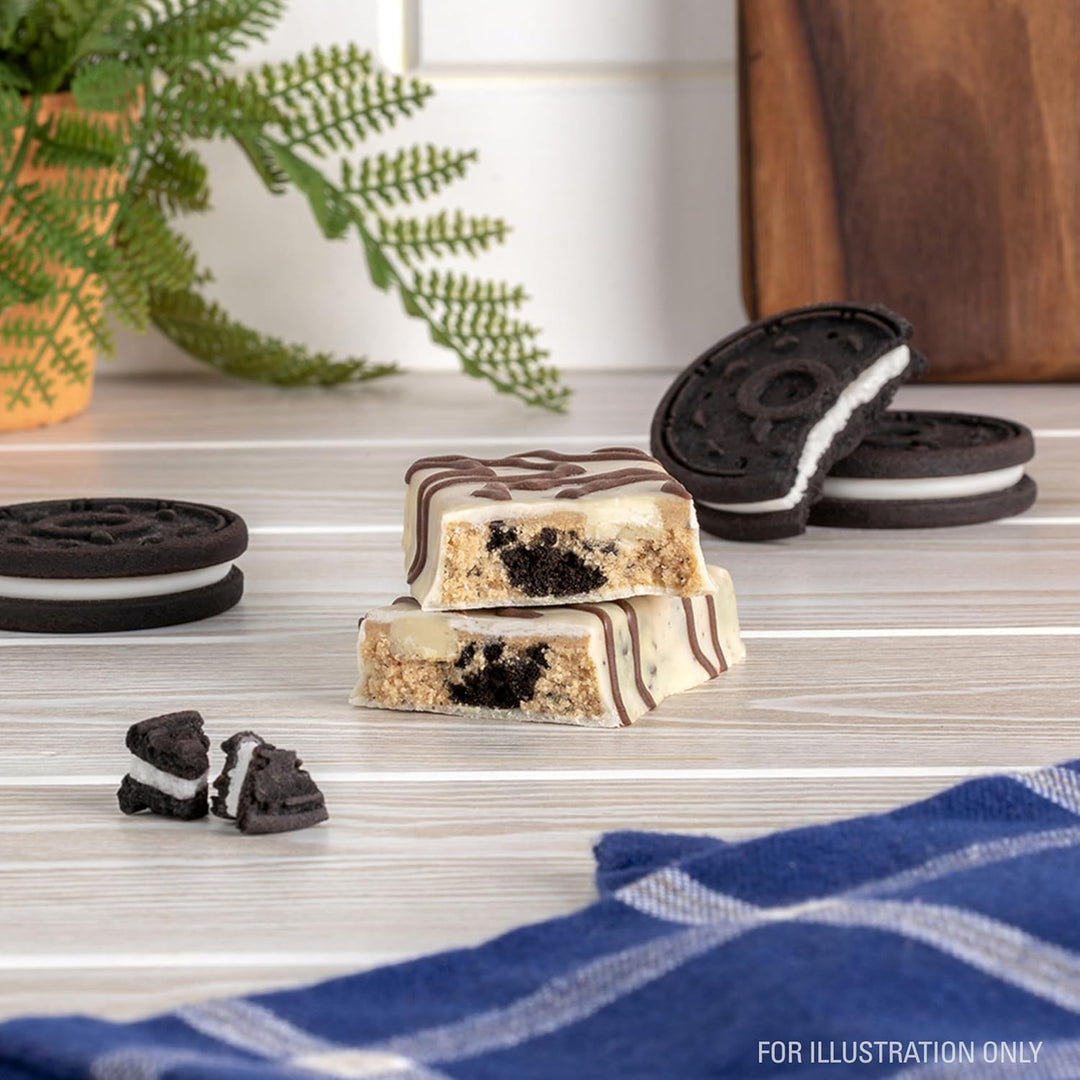 Treat yourself to the decadent taste of Quest Dipped Cookies &amp; Cream Protein Bars—classic cookies &amp; cream flavor dipped and drizzled in rich chocolate. Each bar packs 18g high-quality dairy protein, 3g net carbs, and just 1g sugar, making it a perfect keto-friendly, gluten-free snack. Ideal for on-the-go energy, post-workout recovery, or a healthy dessert, these protein bars satisfy cravings while supporting muscle growth and balanced macros without added sugar.