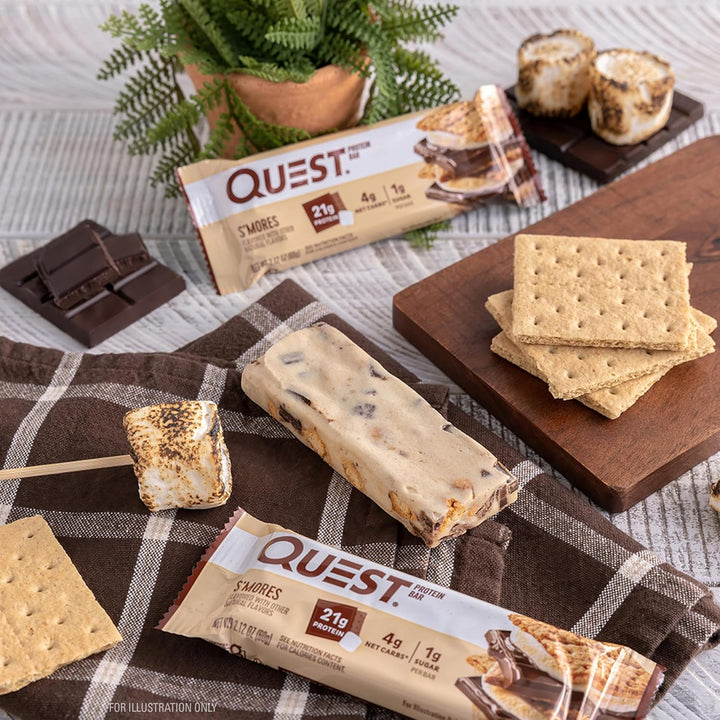 Enjoy campfire flavor anytime with Quest Nutrition S’mores Protein Bars. Each bar delivers 21g of complete dairy-based protein, 1g sugar, 4g net carbs, and 14g fiber to keep you fueled and satisfied. These keto-friendly, gluten-free snack bars provide all 9 essential amino acids for muscle recovery and energy. Perfect for on-the-go adventures, post-workout fuel, or a guilt-free dessert, Quest S’mores bars give you the sweet, chocolatey taste of classic s’mores—without added sugar and with a balanced macro p
