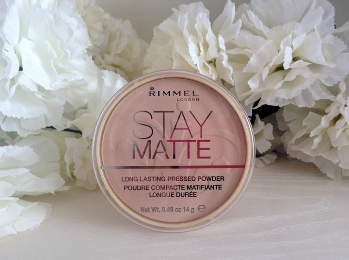 Pink toned pressed powder for soft natural look